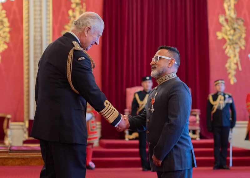 Chef Vineet Bhatia receiving his MBE from King Charles III